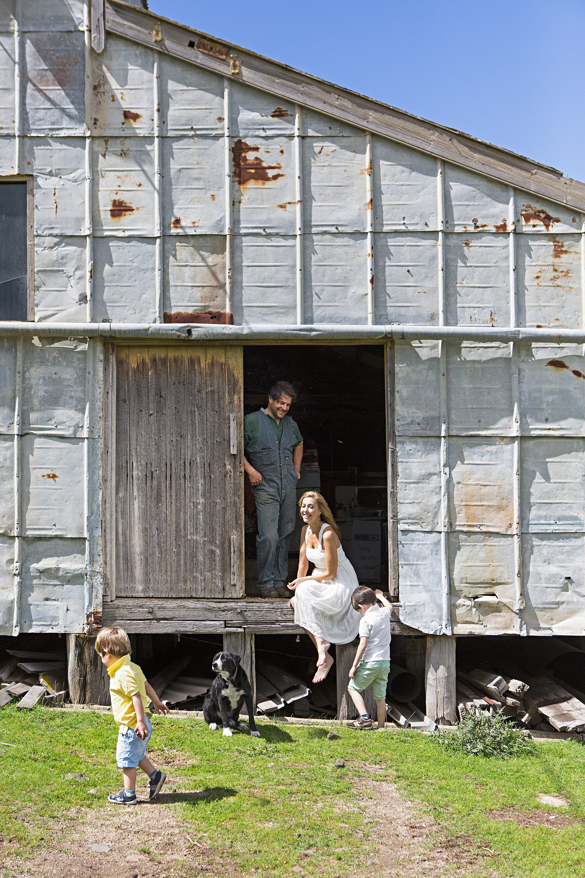 Catriona Rowntree and family at the shearing shed at her property in rural Victoria.