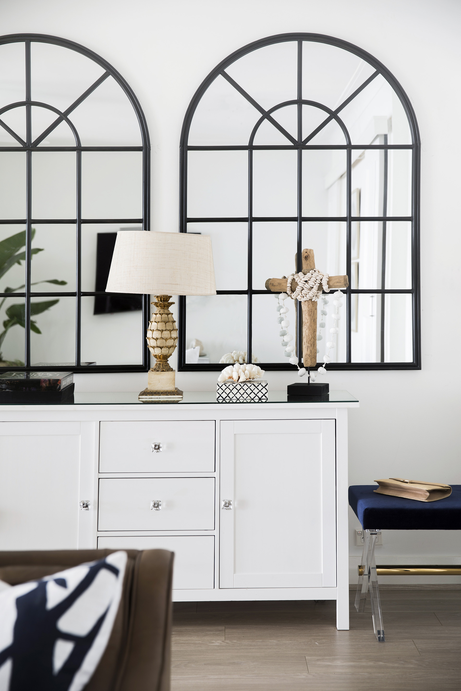 Coastal Hamptons style console and arched mirrors at the home of Charlie Albone and Juliet Love.