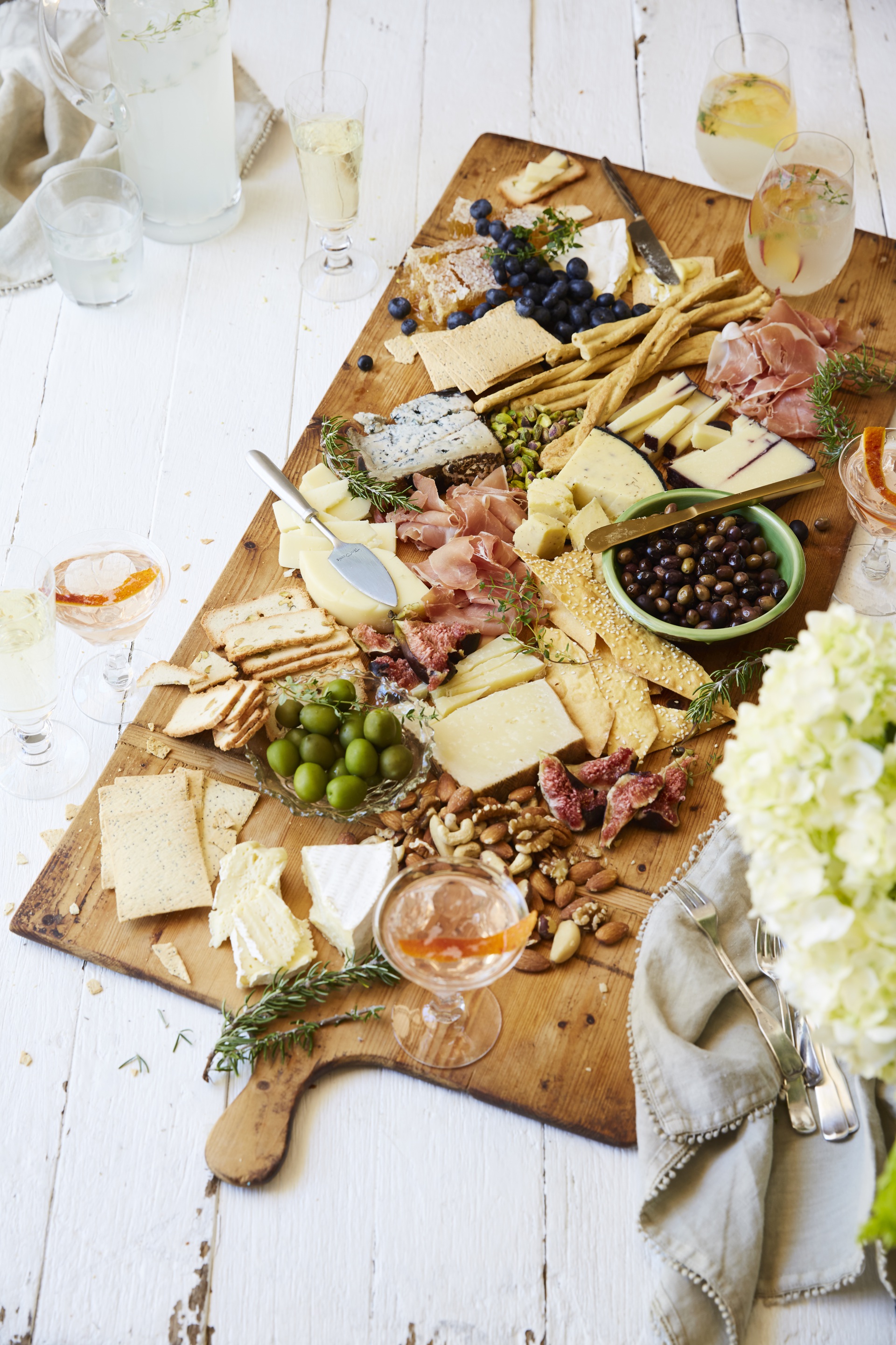 Antipasto grazing platter served on a timber board.