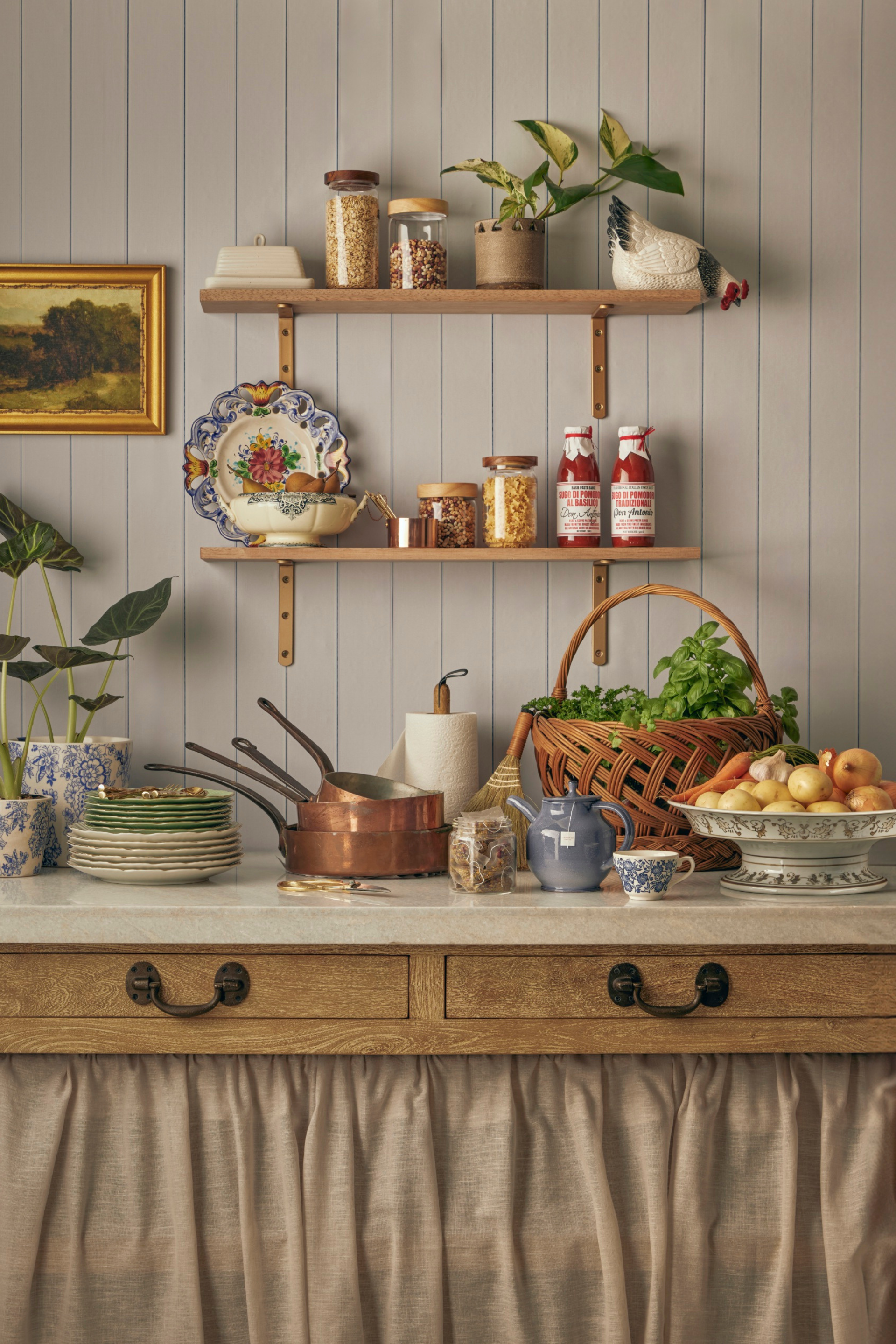 pantry with open shelves and gathered linen shelf skirt