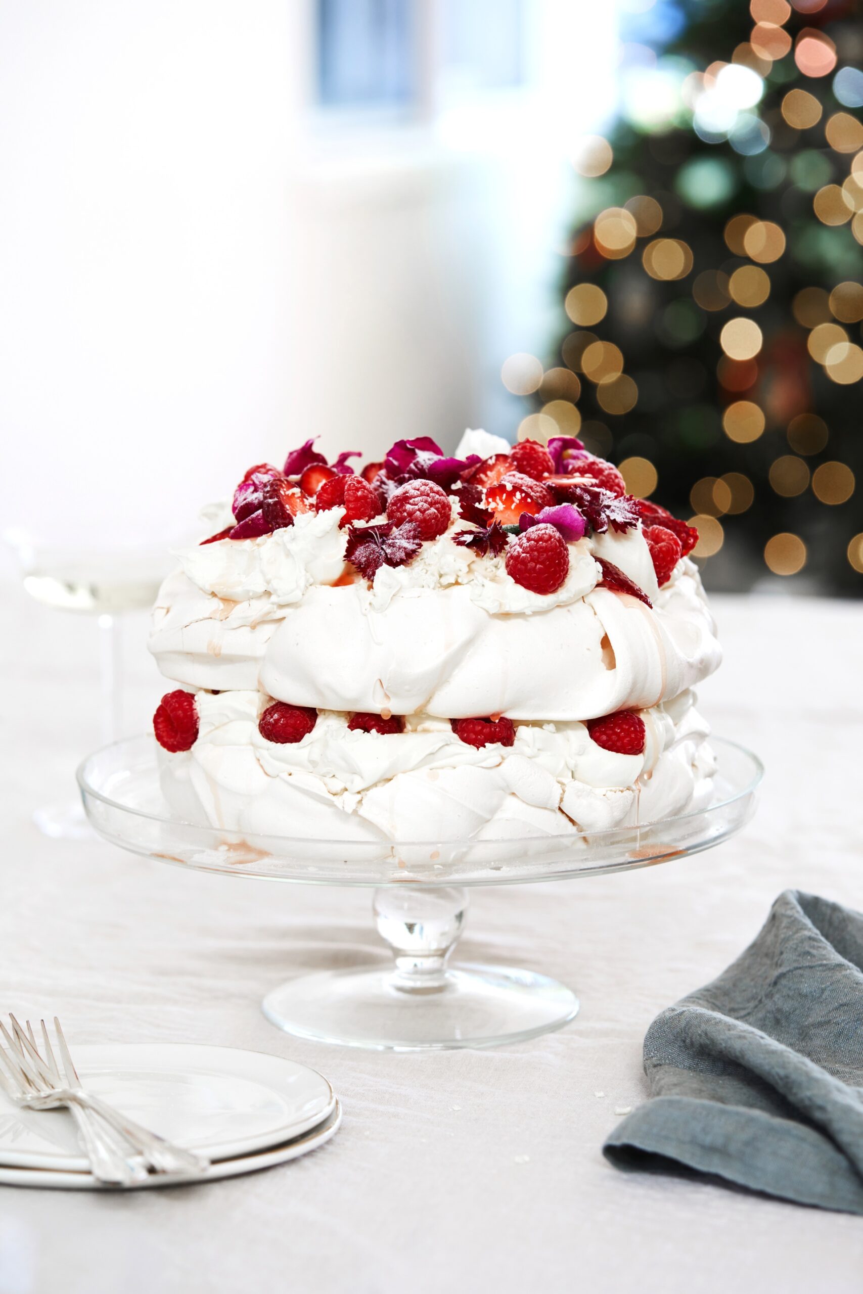 White forest pavlova with raspberries and strawberries.