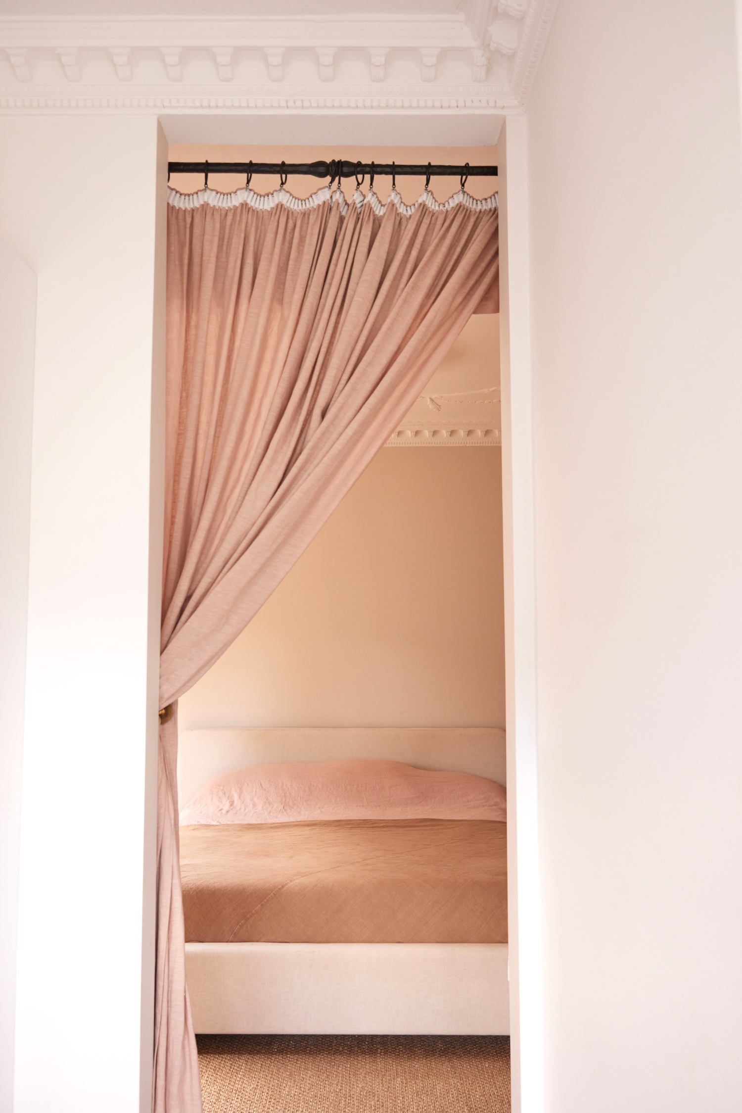 Olli Ella cofounder Chloe Brookman home main bedroom velvet curtain door