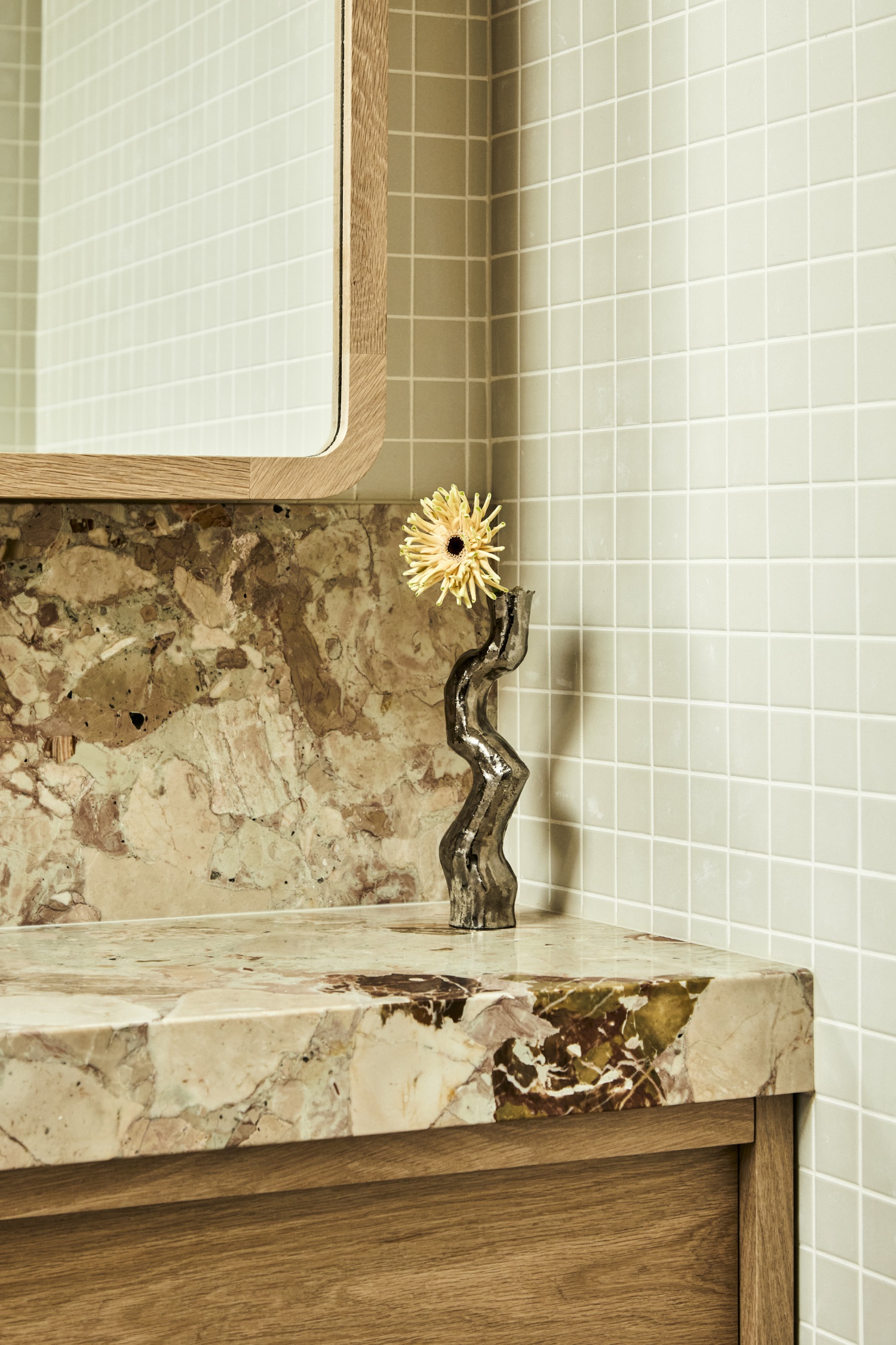 Darren Palmer's Bondi home bathroom vanity with vase.