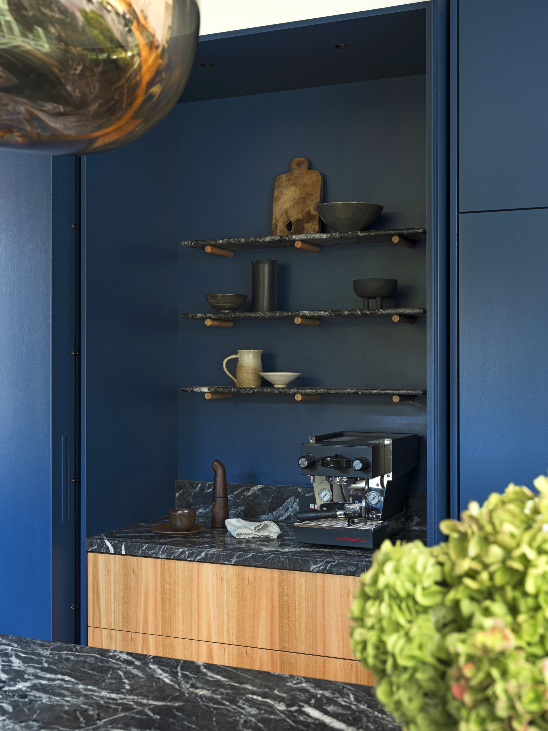 Blue open shelving. 