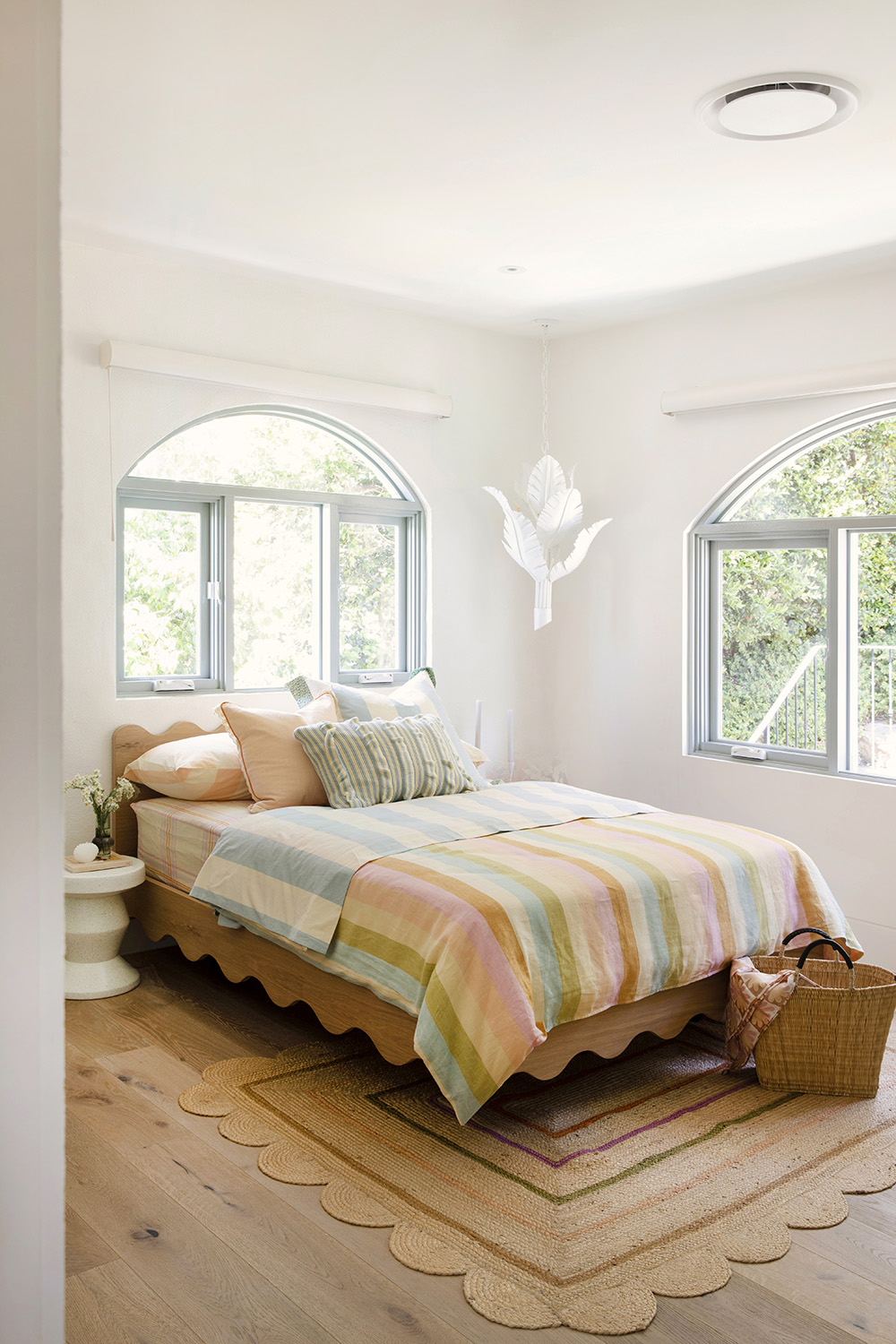White and pastel teen girl bedroom by Three Birds Renovation