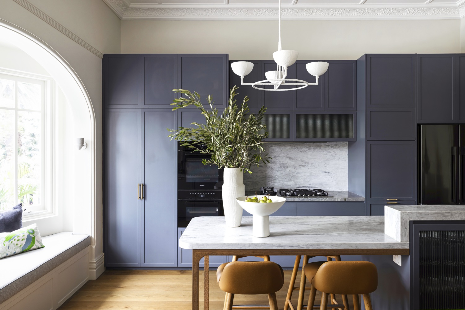 modern kitchen with blue cabinets