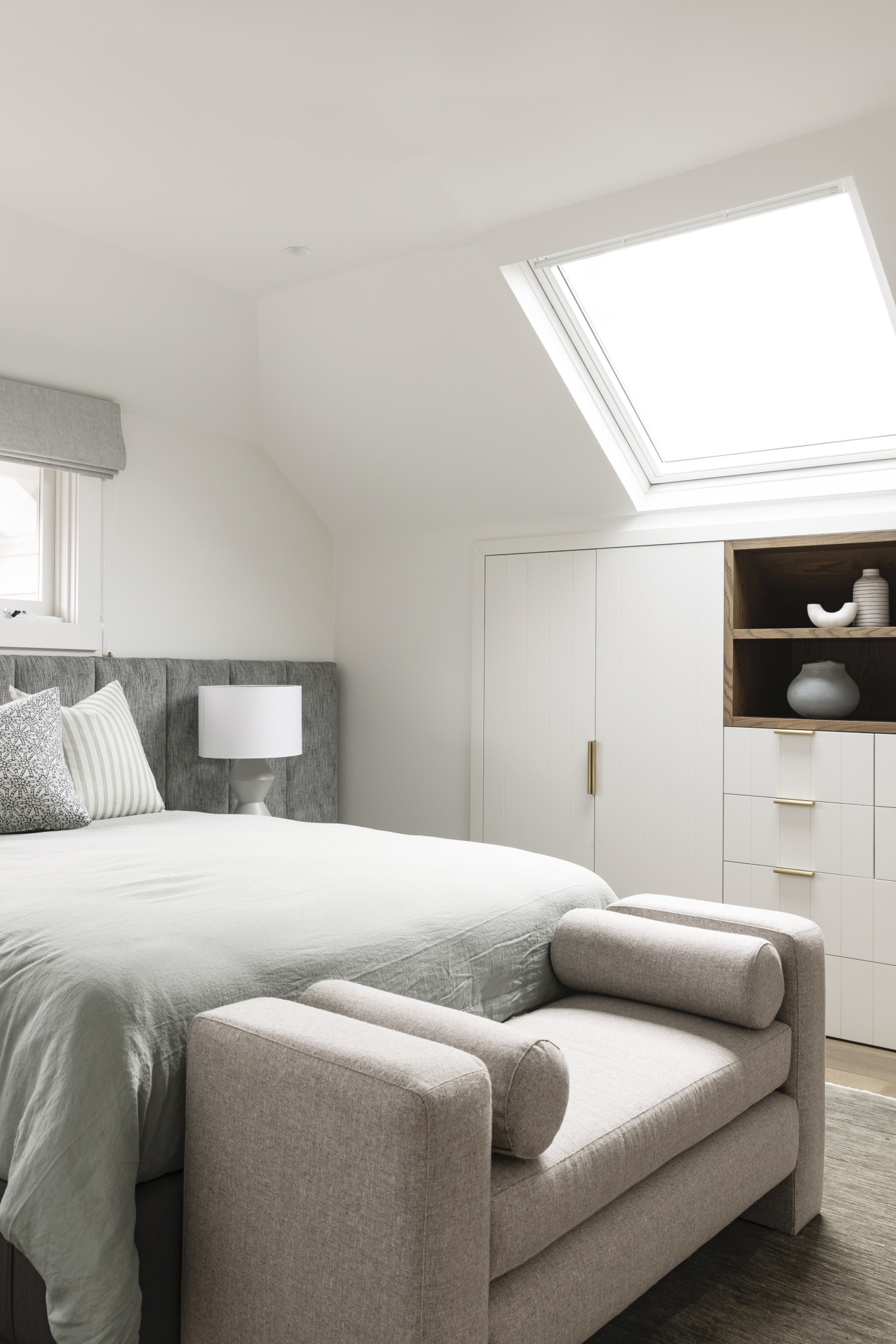 Bedroom with seating at end of bed